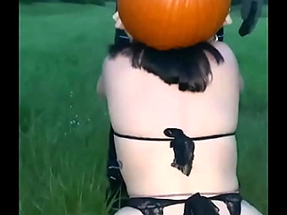 A Halloween-themed BDSM video featuring a pumpkin as a substitute for a girlfriend's vagina.